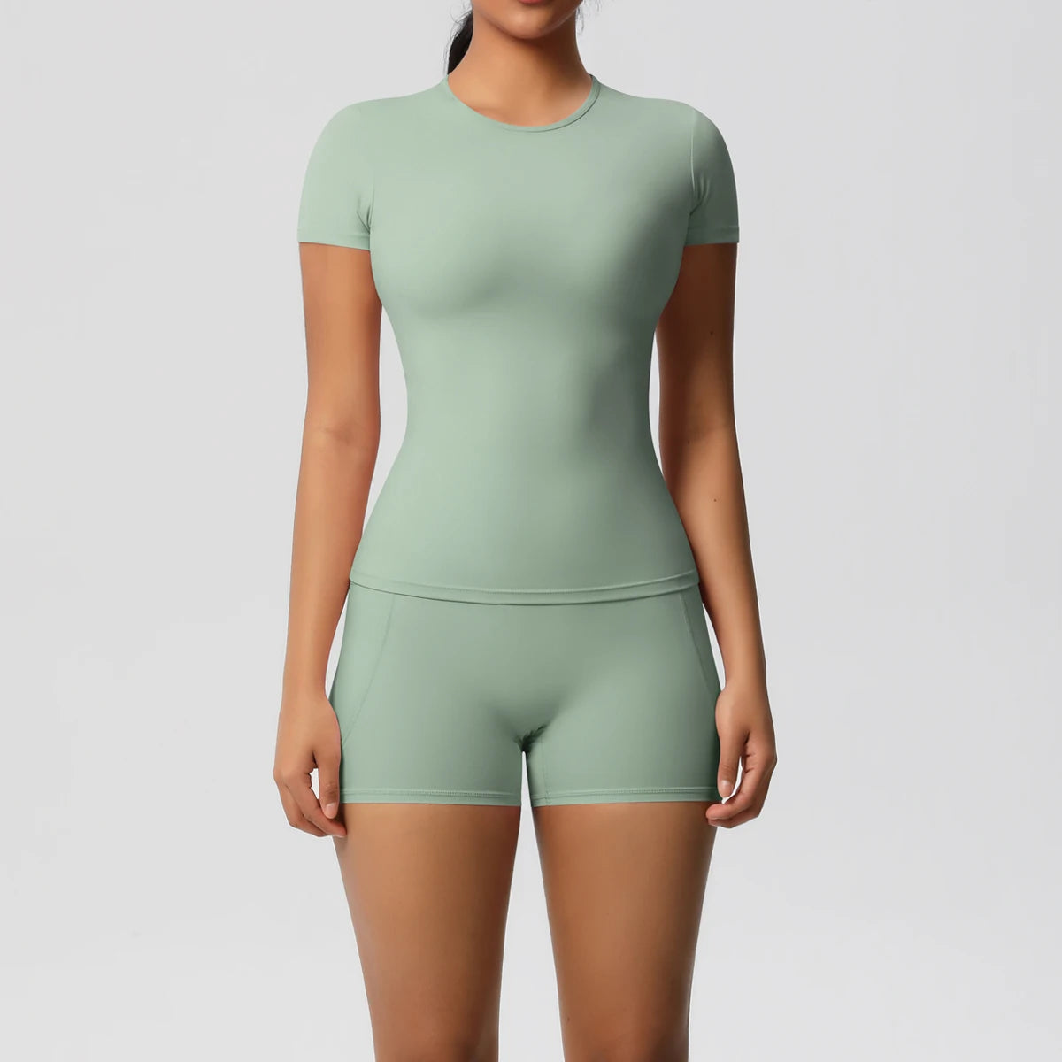 Ensemble sport femme 2 pièces – T-shirt push up et short taille haute fitness