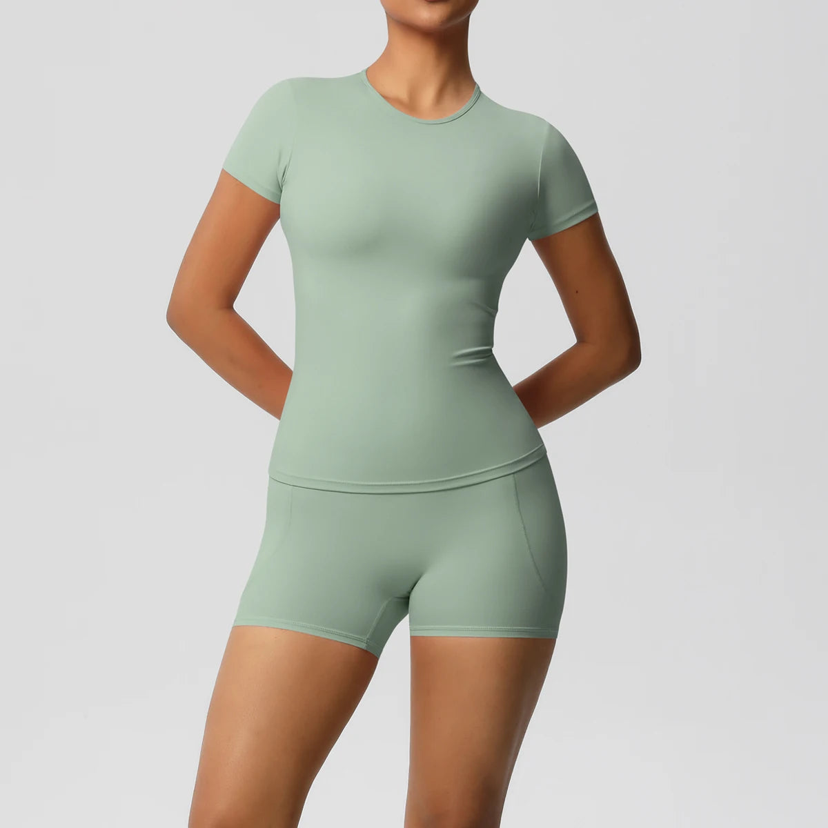 Ensemble sport femme 2 pièces – T-shirt push up et short taille haute fitness